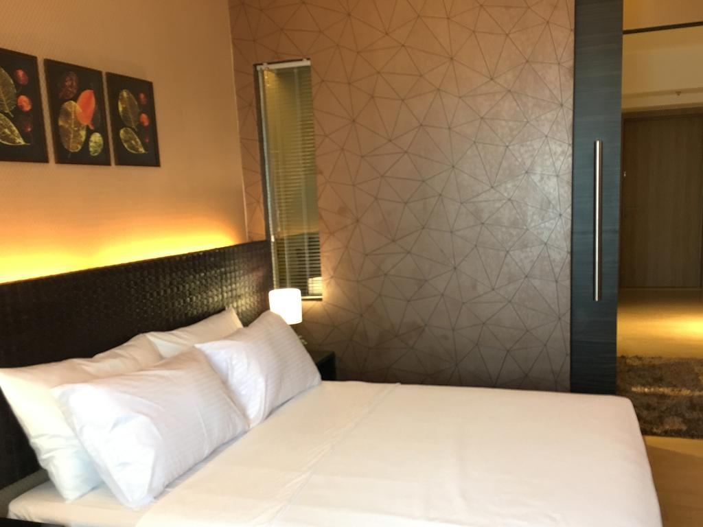 Shang Luxury Suites Mandaluyong Kamer foto